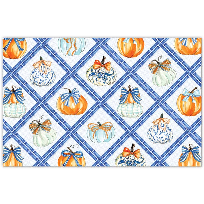 Disposable paper placemat with handpainted chinoiserie pumpkins, bows, and blue bamboo lattice.