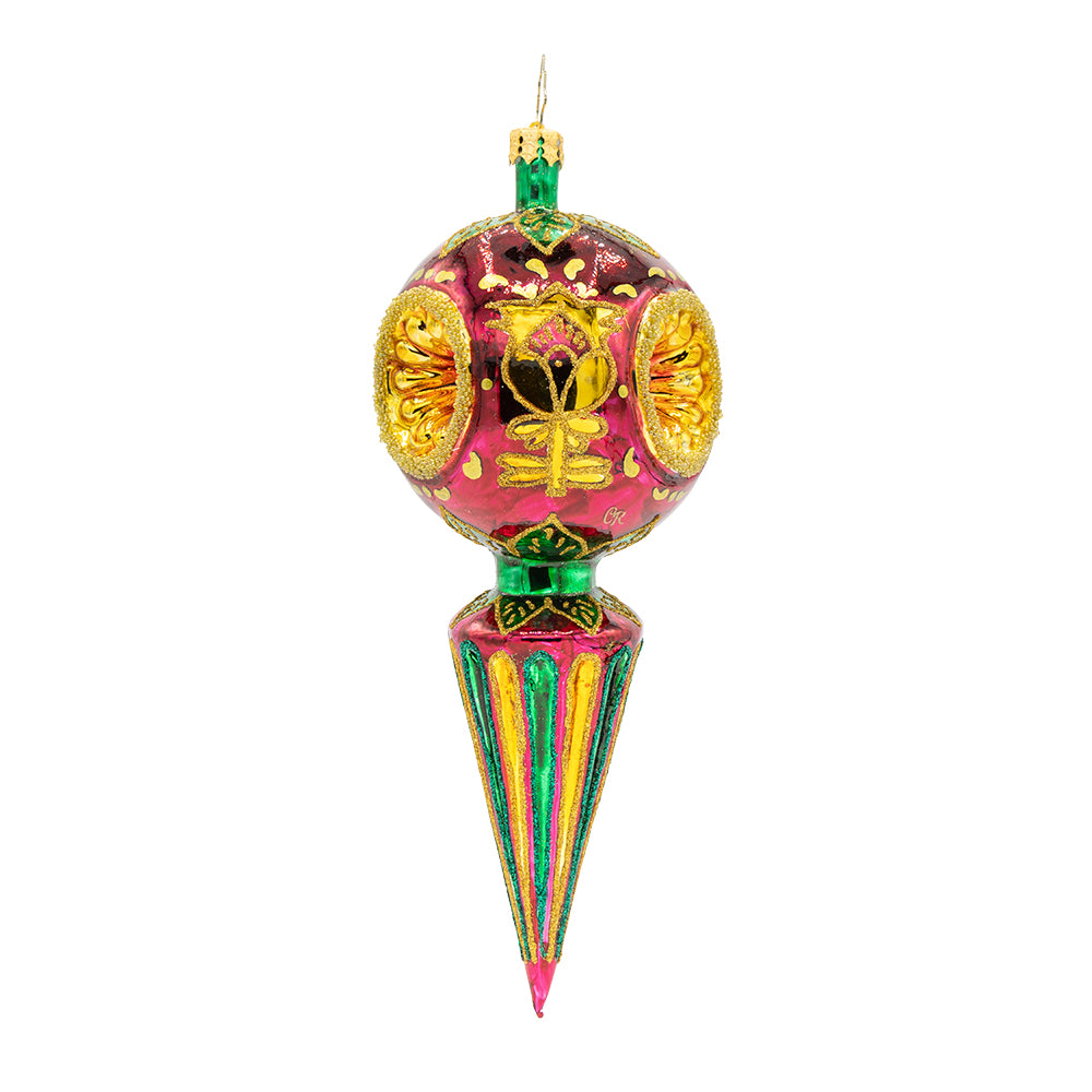 Golden Fluted Spire glass ornament with pink, green, and gold hand-painted folk designs.