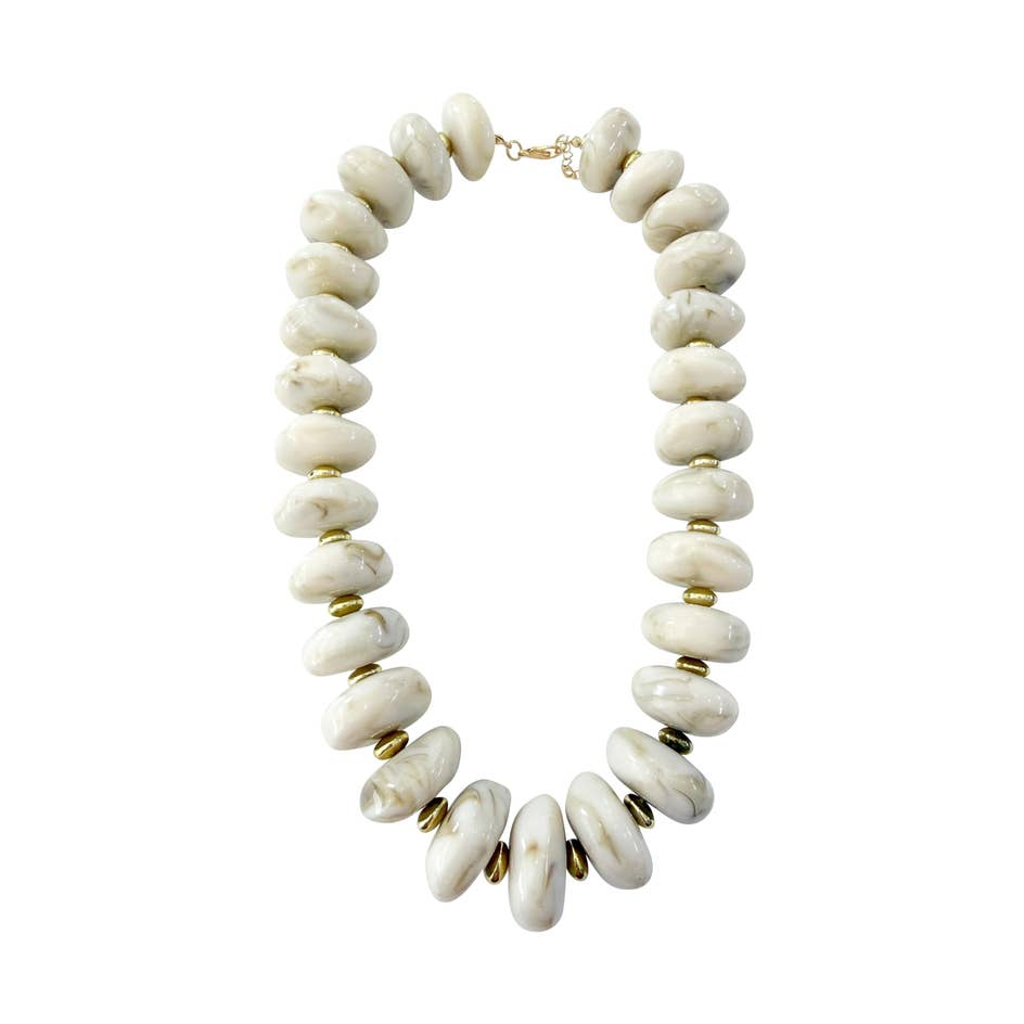Randi Chunky Beaded Necklace featuring large marbled white and tan beads with gold-tone spacers.