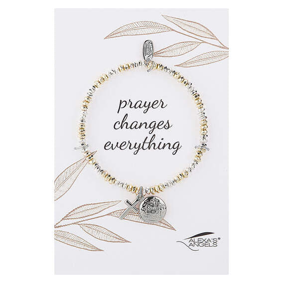 Delicate stretch bracelet in shiny silver and gold tones featuring a metal cross and an openable prayer locket.