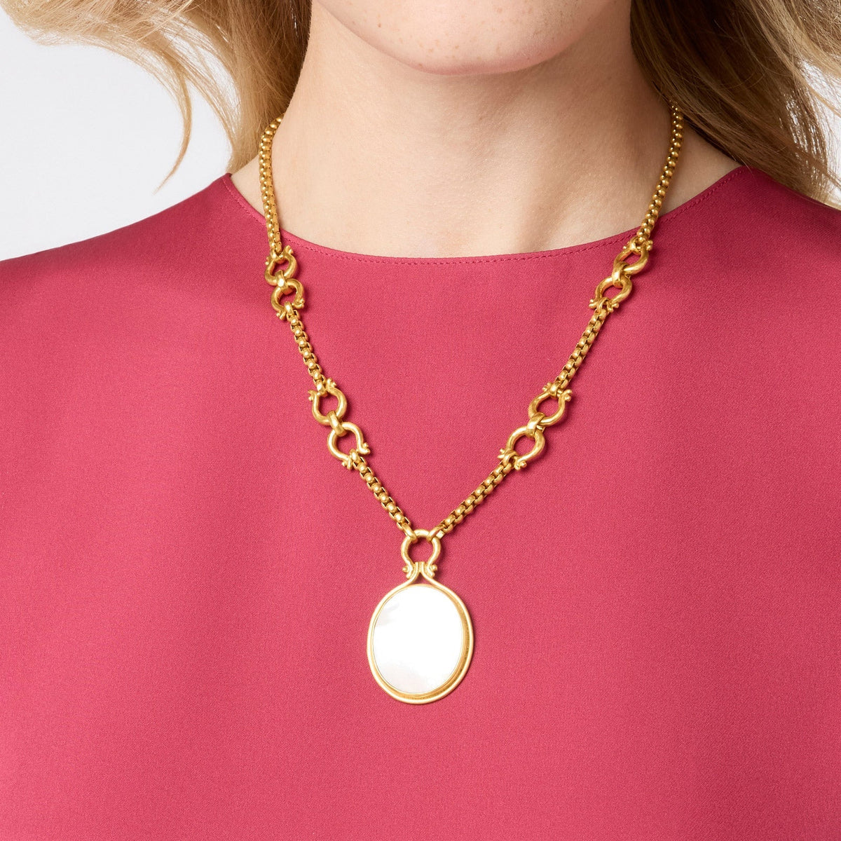 Saratoga Statement Necklace in 24K gold plate with a large oval mother of pearl pendant.