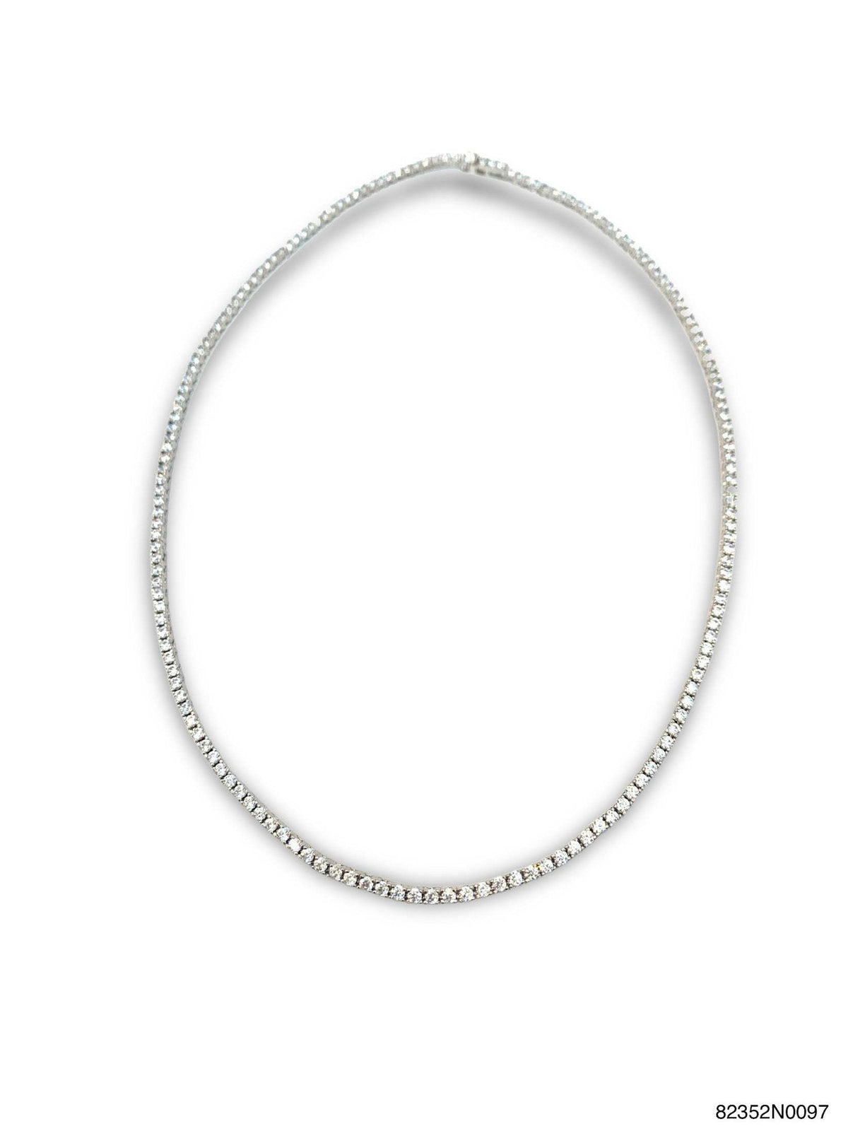 White gold finish tennis necklace with sparkling clear stones on a brass box closure chain.