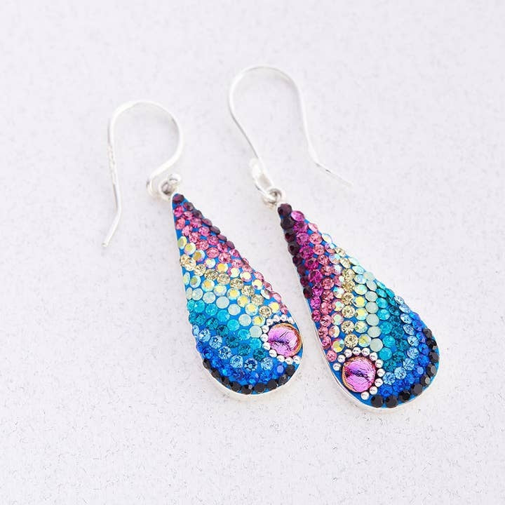 Long teardrop mosaic earrings in sterling silver with Austrian crystals forming a geometric pattern.