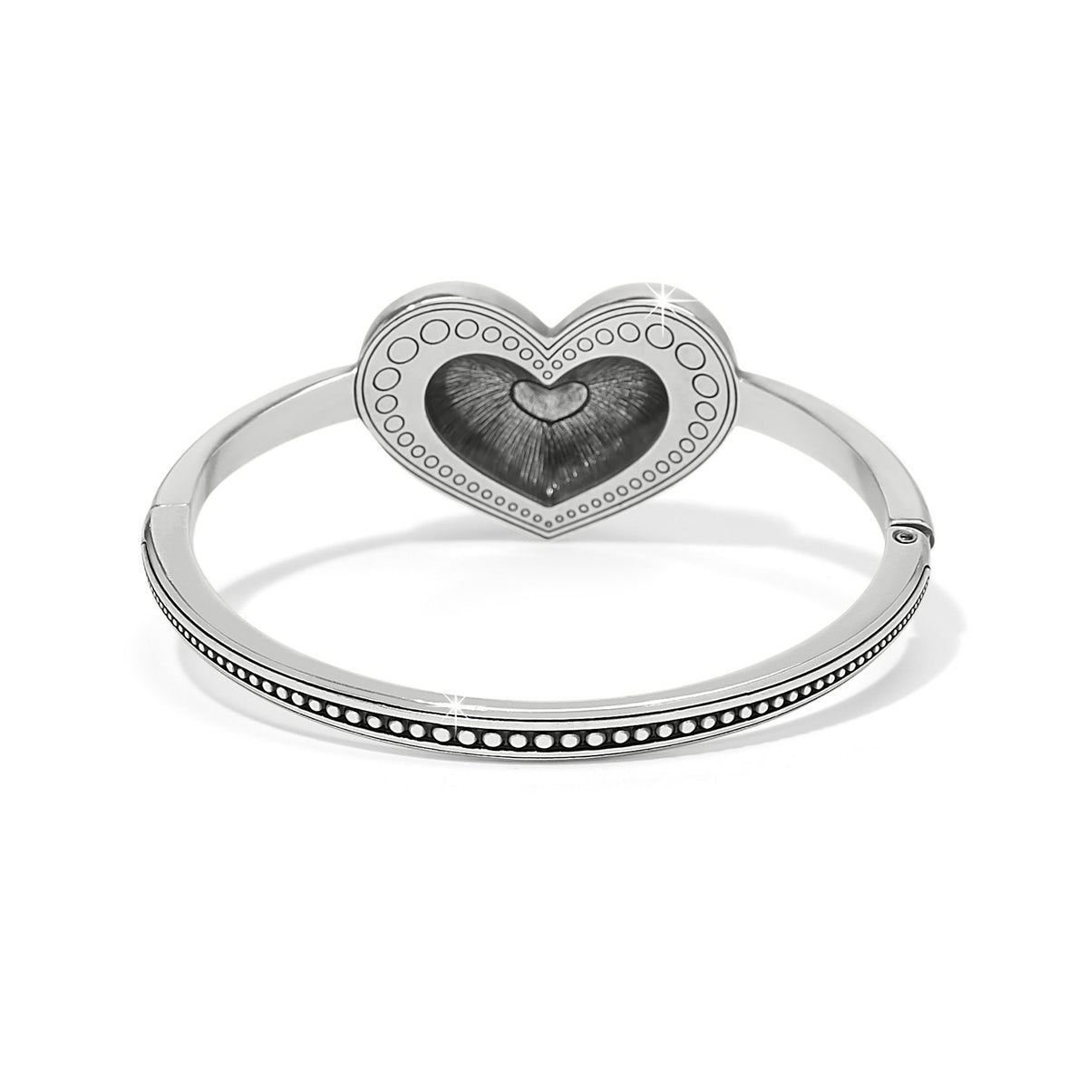 Silver plated hinged bangle with red enamel heart center
