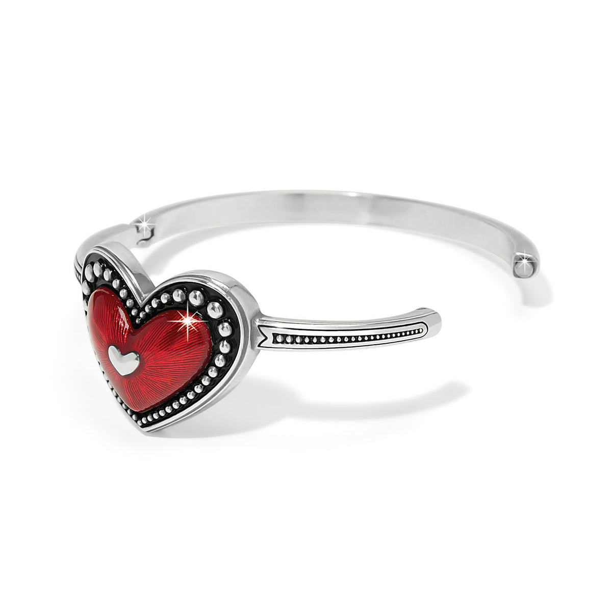 Silver plated hinged bangle with ruby red enamel heart featuring silver beading accents