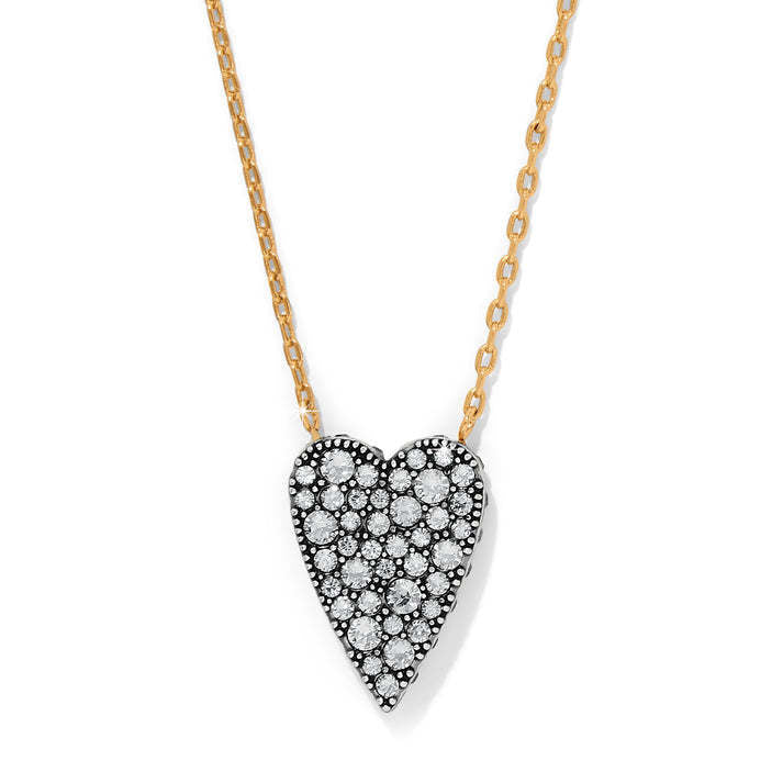 Silver-gold reversible heart-shaped necklace with sparkling pave crystals on a lobster claw clasp.