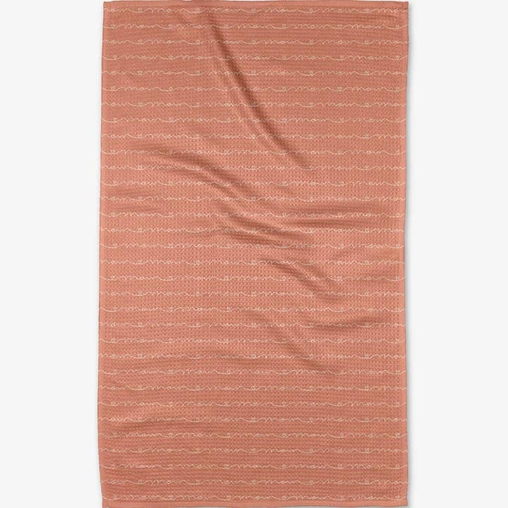 Recycled polyester waffle weave tea towel with single-sided love-of-mom print and hang loop.