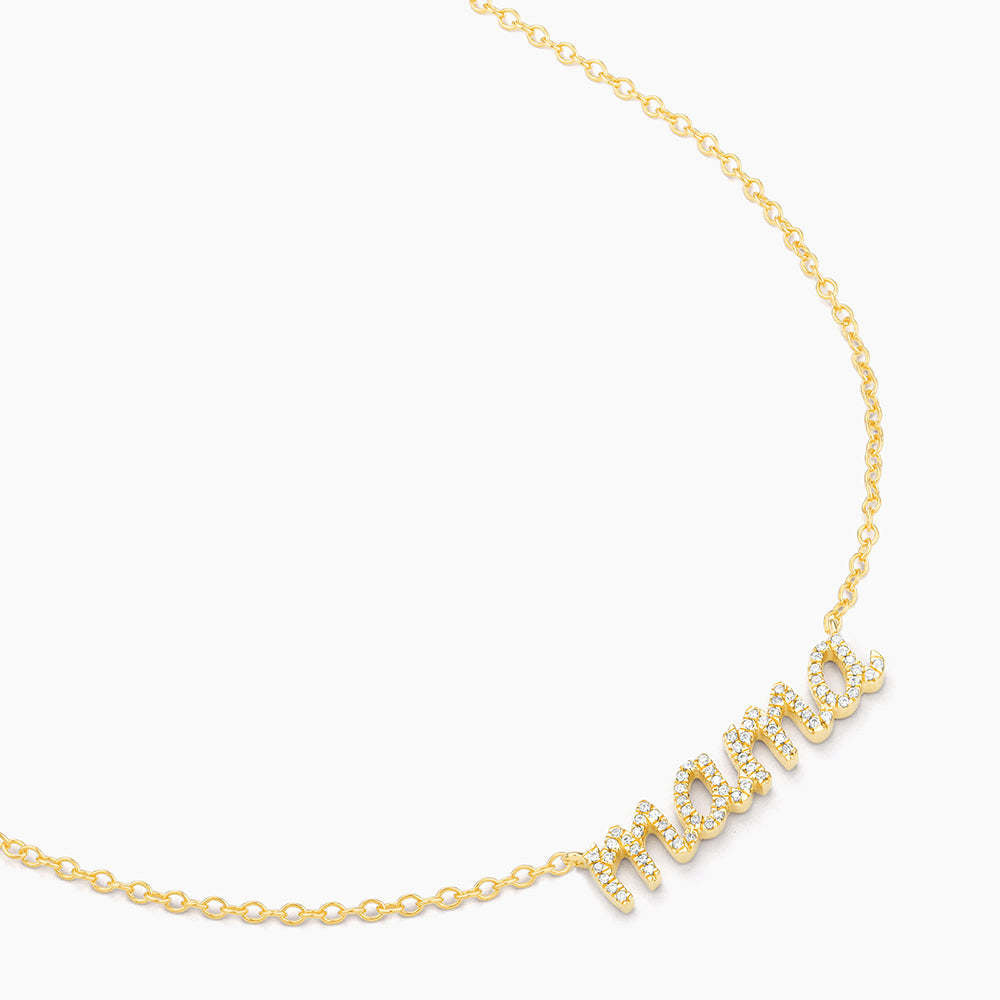 Silver Love You Mama pendant necklace with diamond accents on a chain.