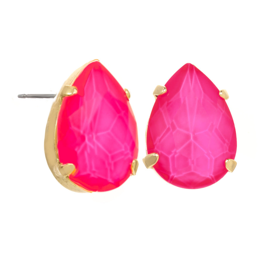 Gold-tone stud earrings featuring faceted pear-shaped fuchsia stones with a geometric pattern.