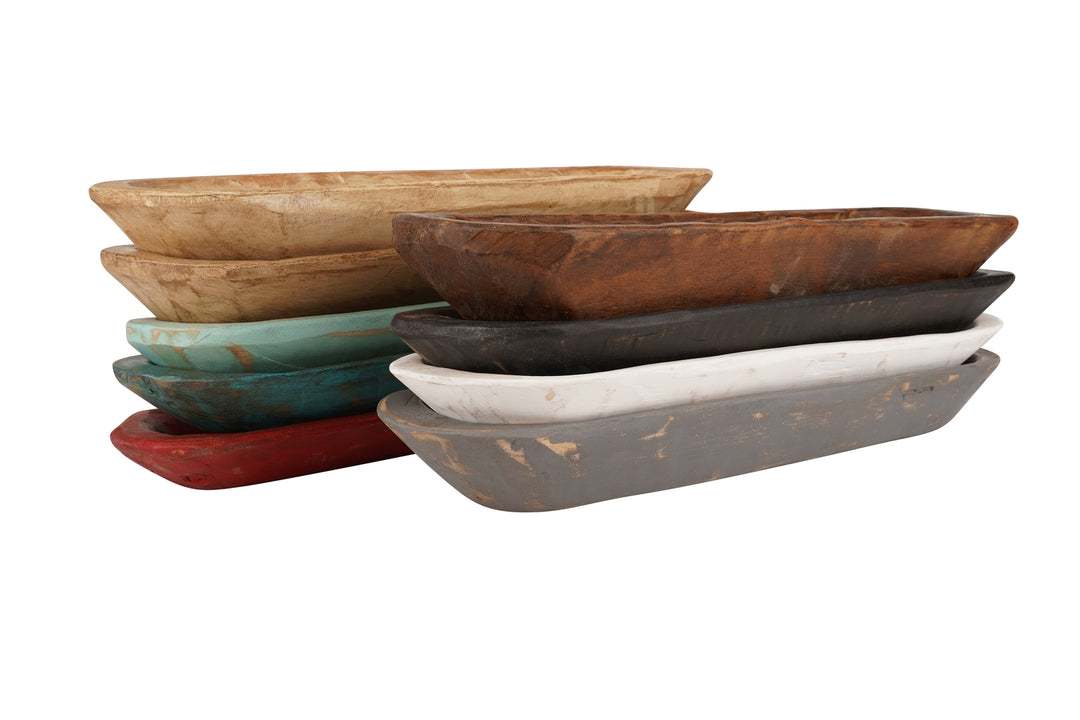 Stack of small wooden baguette bread bowls in various colors including natural, brown, and grey.
