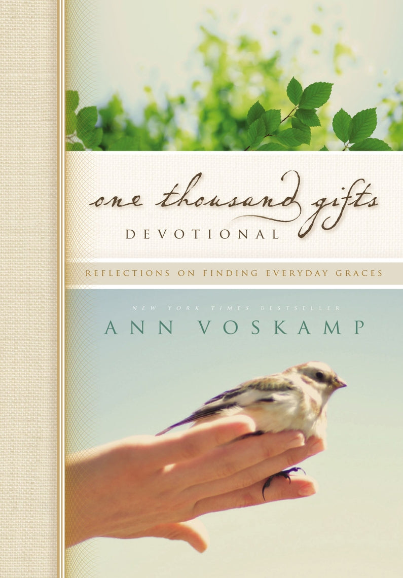 One Thousand Gifts Devotional book cover with a bird on a hand.