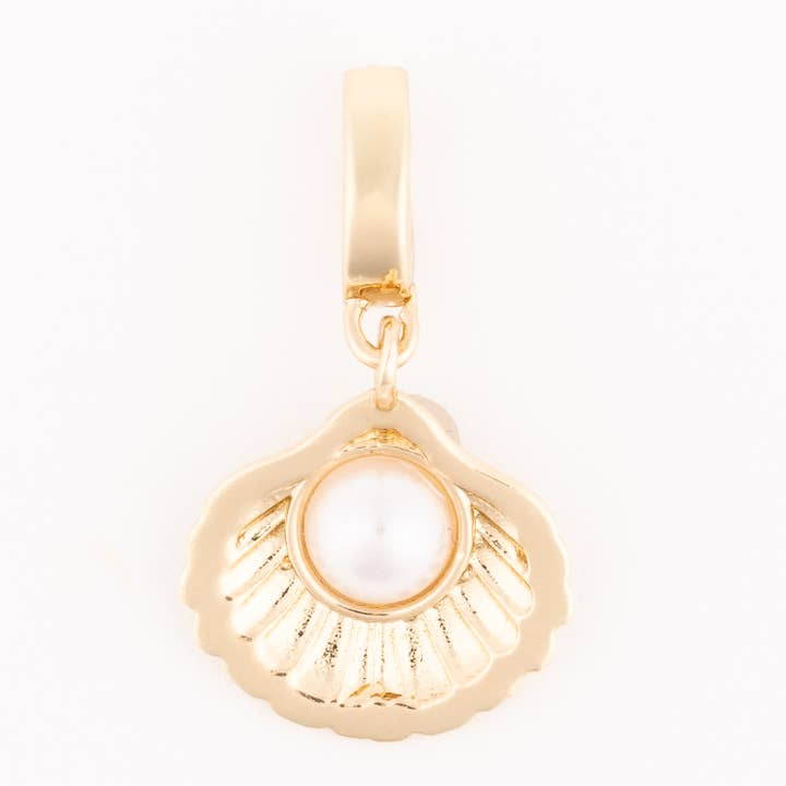 Gold-toned Sophie Pearl Shell charm featuring a scalloped shell design with a central white pearl.