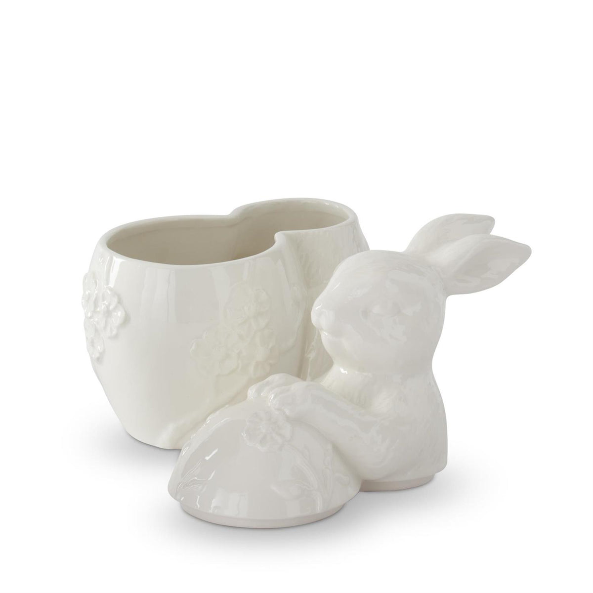 8.5-inch white dolomite ceramic container with embossed flower pattern shaped like an Easter egg and bunny silhouette.