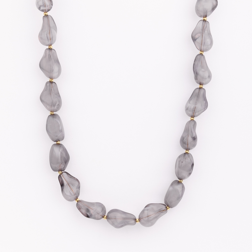 Cami Necklace featuring irregular grey marbled beads separated by small gold spacers.