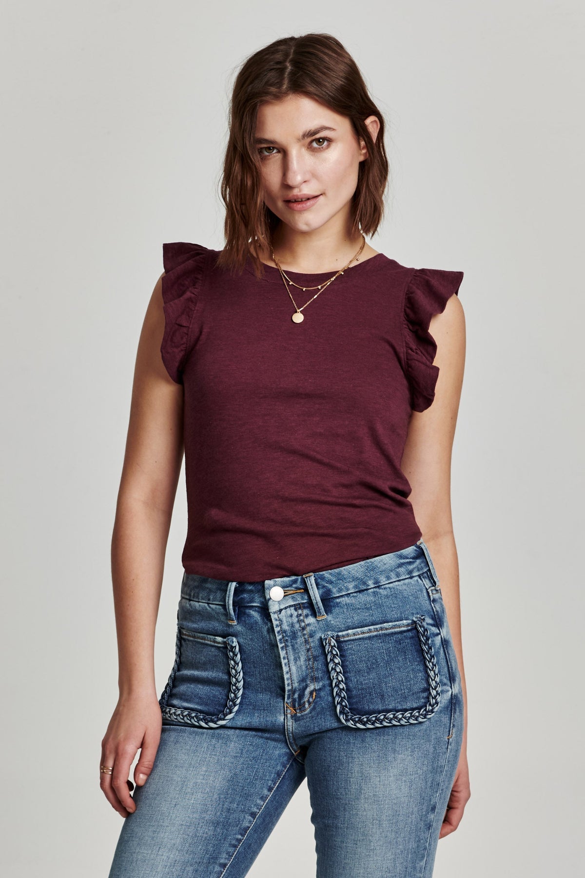 Alice North ruffle-trimmed top in light blue cotton-rayon blend with a relaxed silhouette.