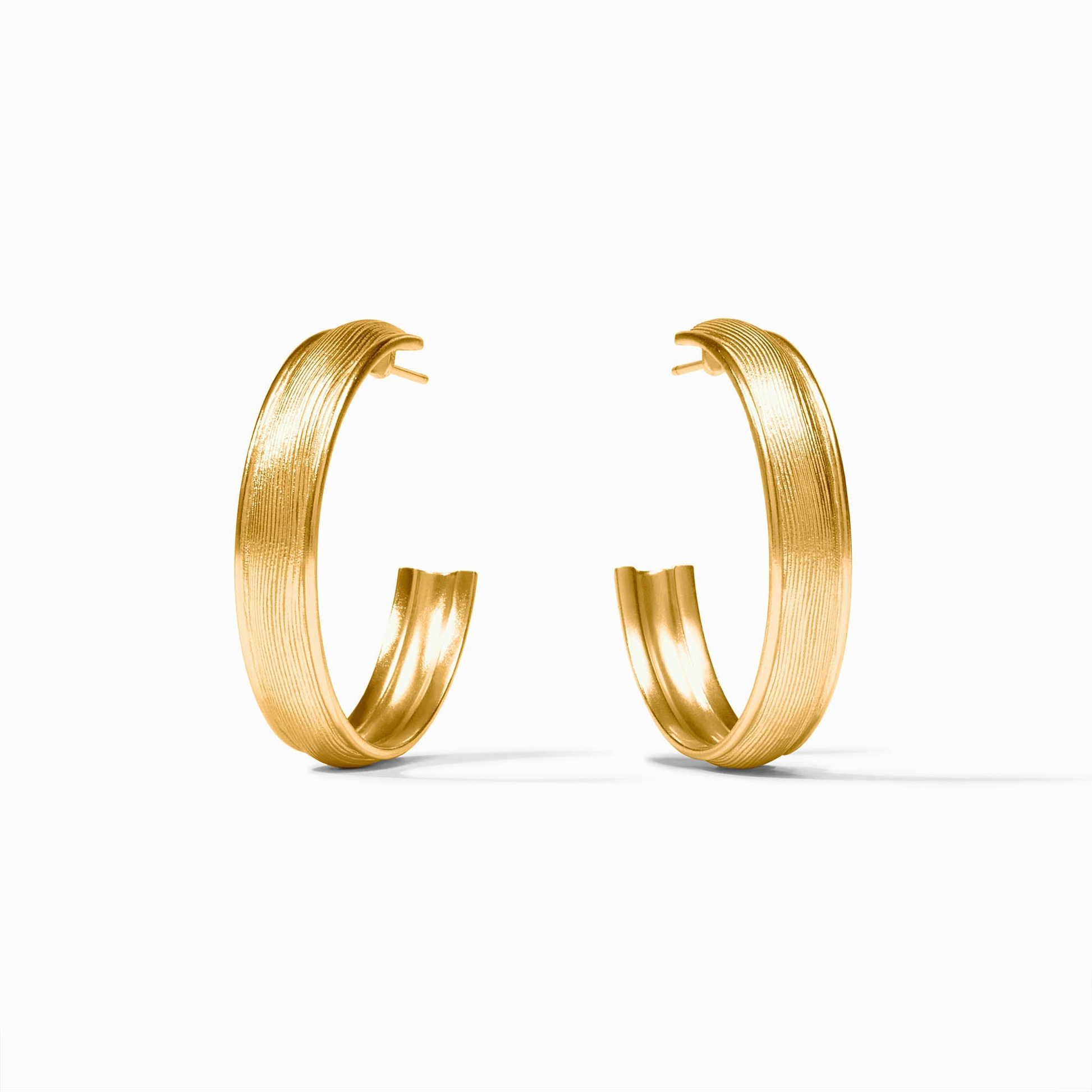 Pair of 24K gold plated Cobblestone Hoop earrings with a textured, ridged finish.