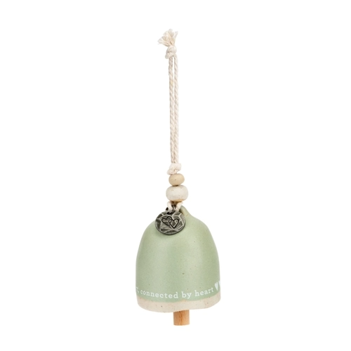 Mini Inspired Bell stoneware candle holder with wood accents and metal cording hanger in natural tones.