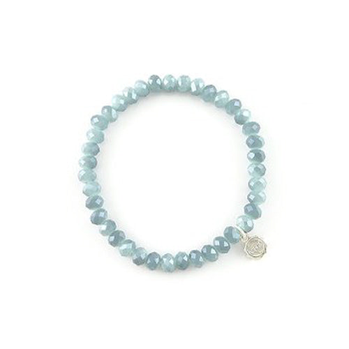 Stretchy bracelet with faceted glass beads in a colorful beaded pattern.