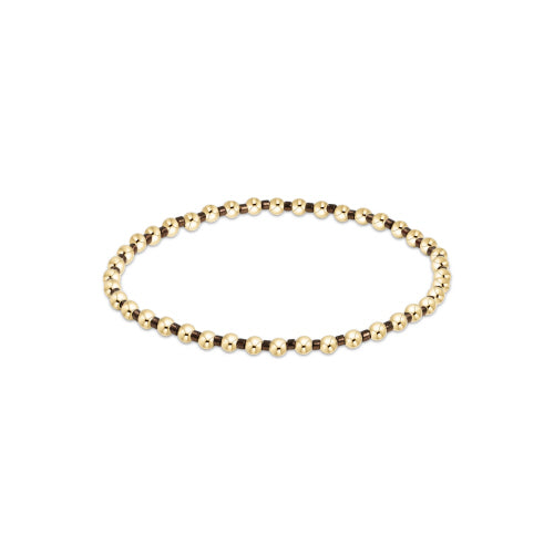 Hope Grateful bracelet featuring mixed 2mm seed beads in spring colors with gold-filled accents on elastic cord.