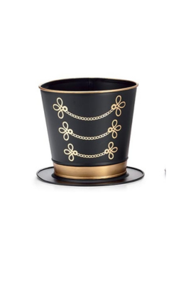 Black and gold nutcracker hat tin planter with decorative gold chain decals and a gold band.