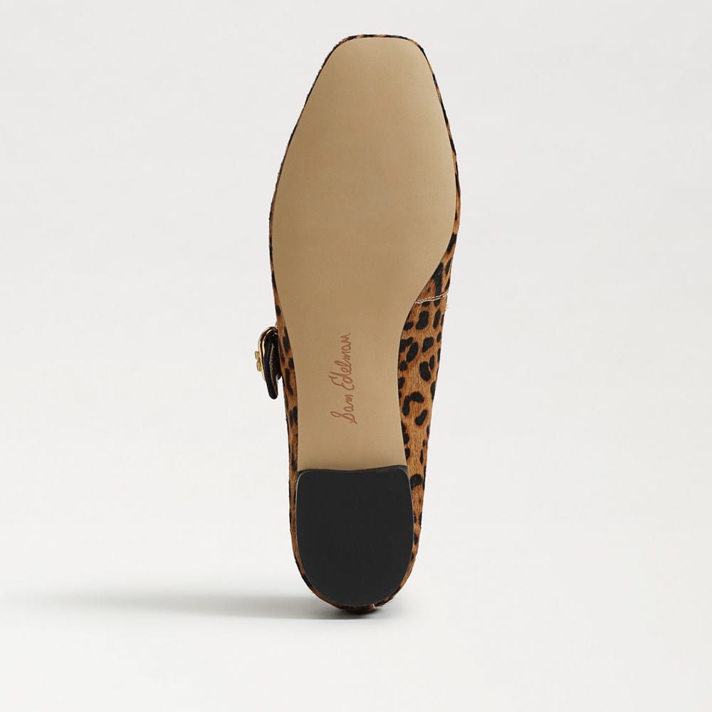 Bottom view of a leopard print Michaela Mary Jane Flat showing the tan sole and Sam Edelman logo.