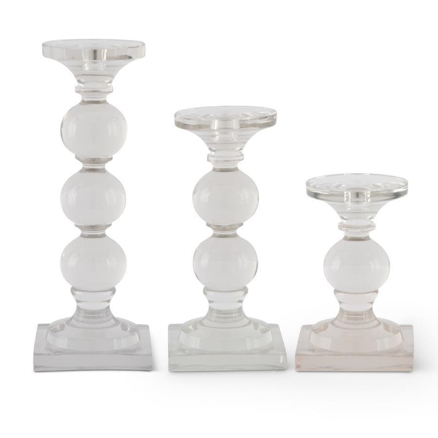 Clear glass taper candleholder with a simple cylindrical pillar shape.