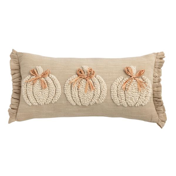 Chambray white square pillow with yarn-embroidered pumpkin, raffia bow, and ruffle flange.