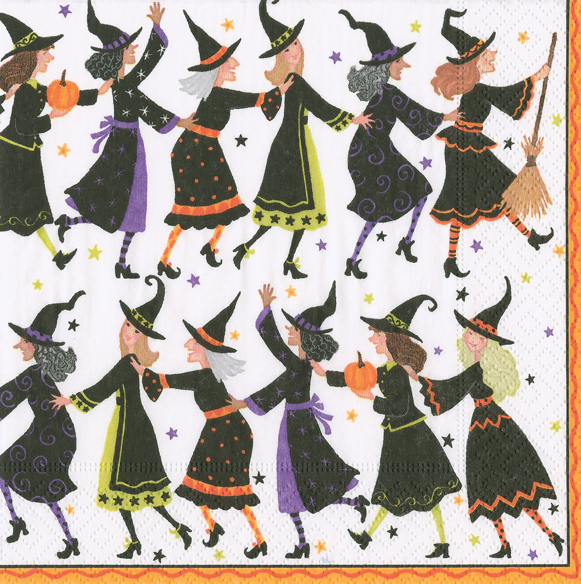 Triple-ply luncheon napkins featuring a black background with white witches dancing in a conga line pattern.