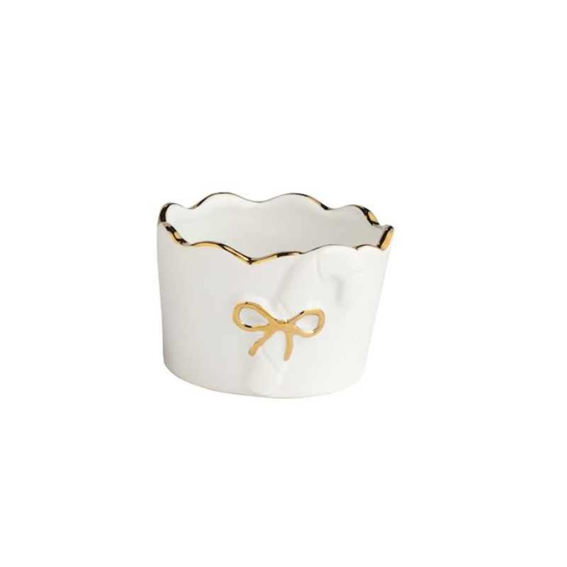 White stoneware tidbit dish with gold scalloped rim and a raised candy cane motif with a gold bow.