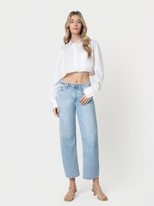 Cropped light wash wide barrel jeans with high rise waist and five pockets.