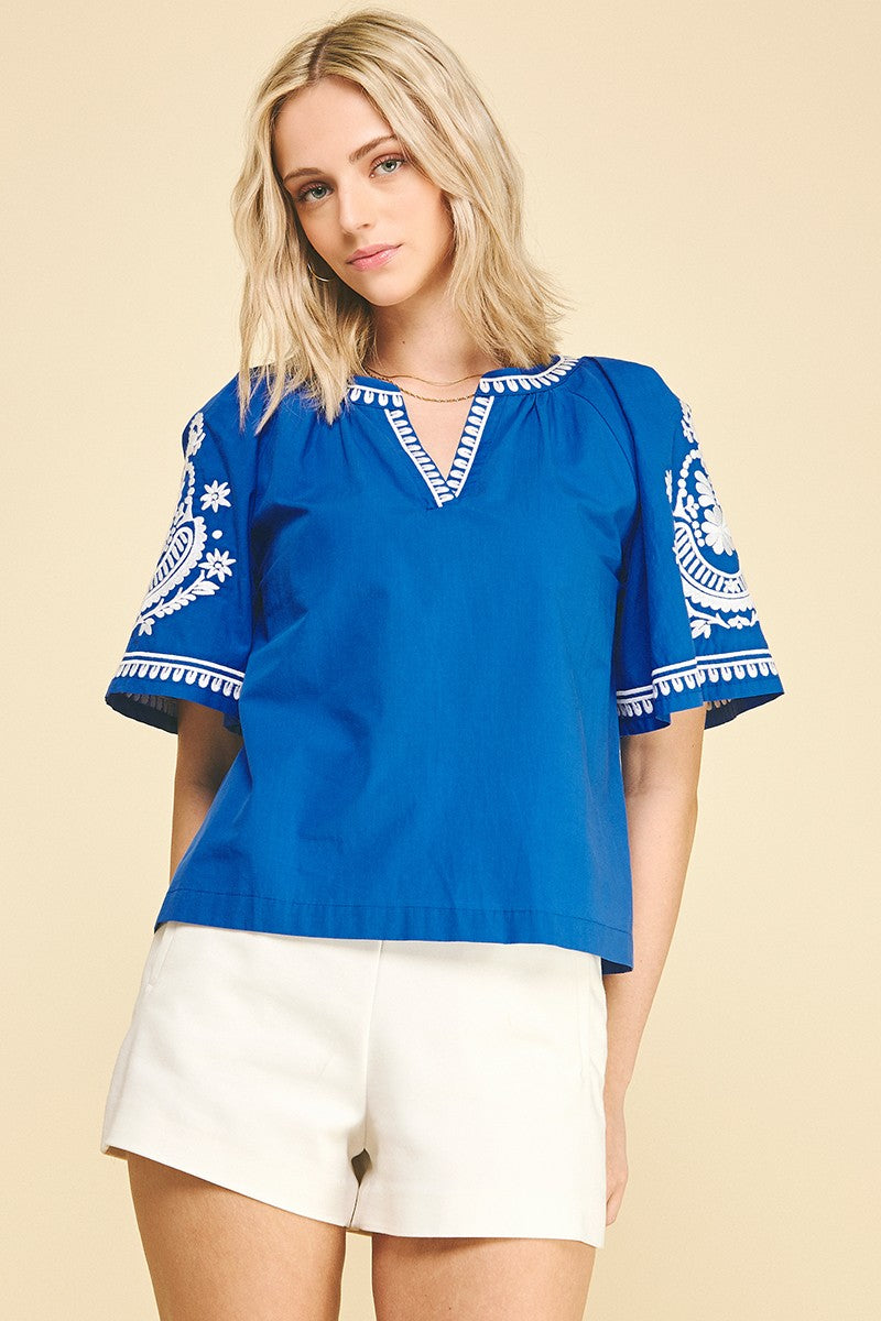 Ally Bohemian embroidered blouse in cotton with floral embroidery and a relaxed silhouette.