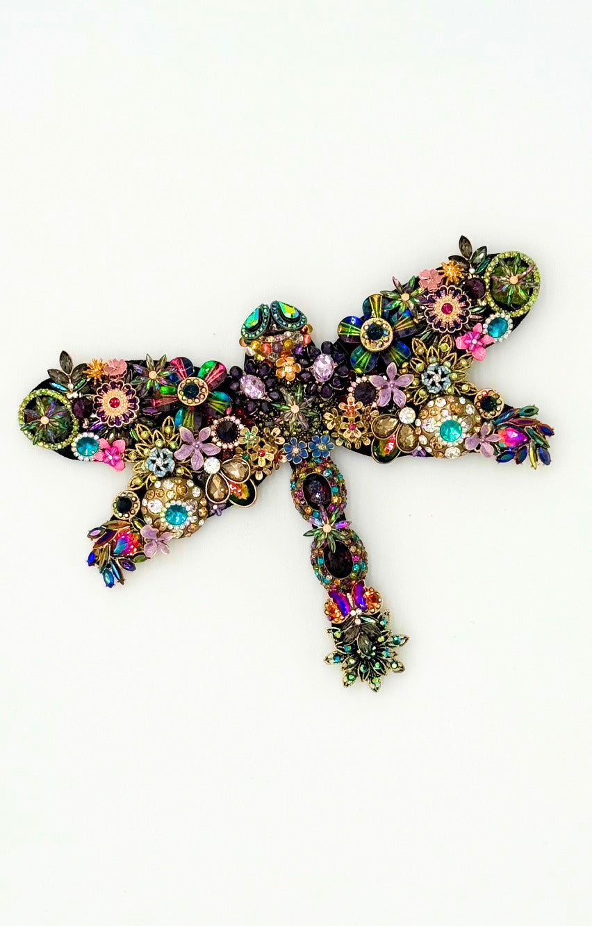 Regal Roam Dragonfly wall decor made of colorful vintage-style jewelry, beads, and floral brooches.