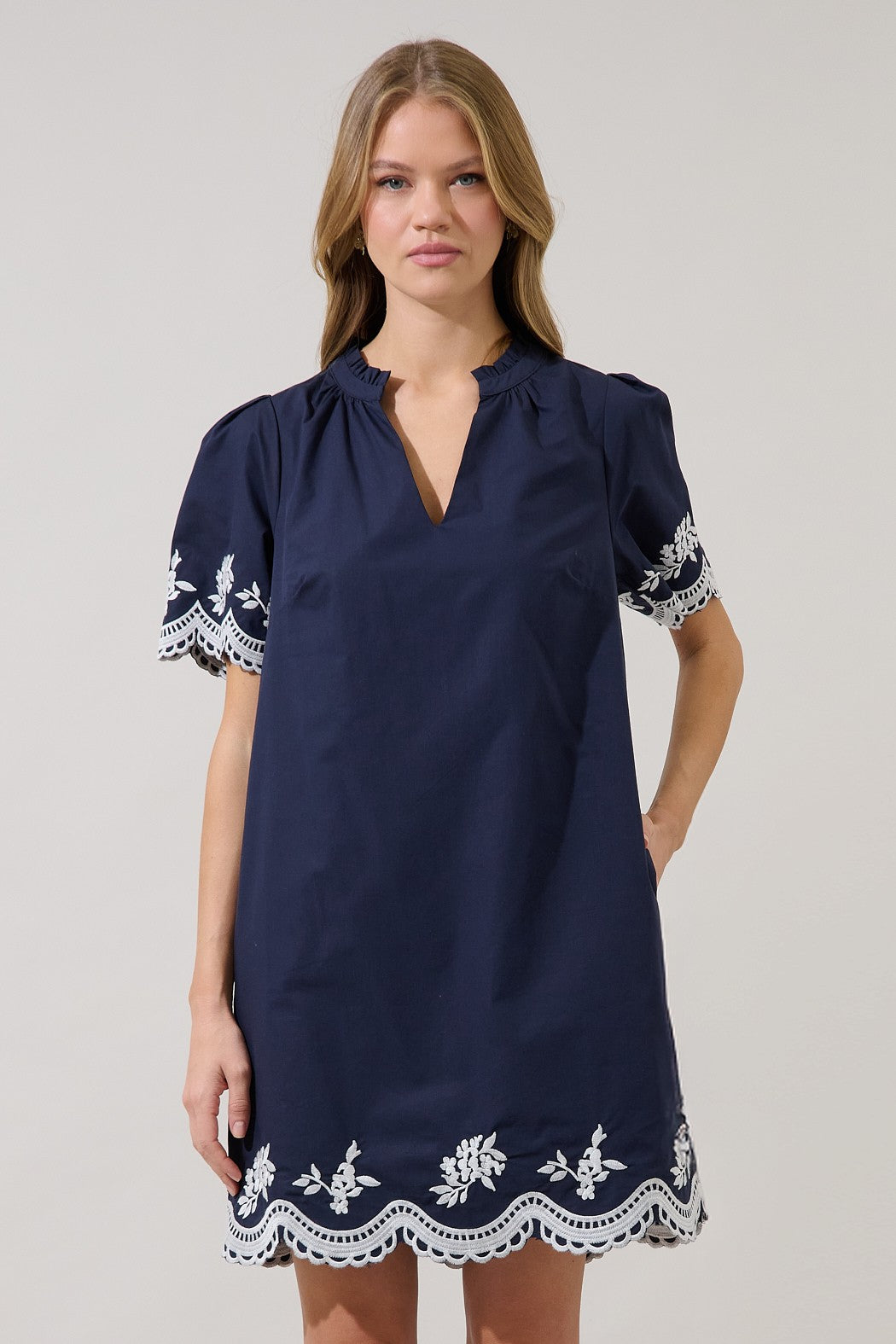 Melania embroidered shift mini dress in light blue with floral embroidery on short sleeves.