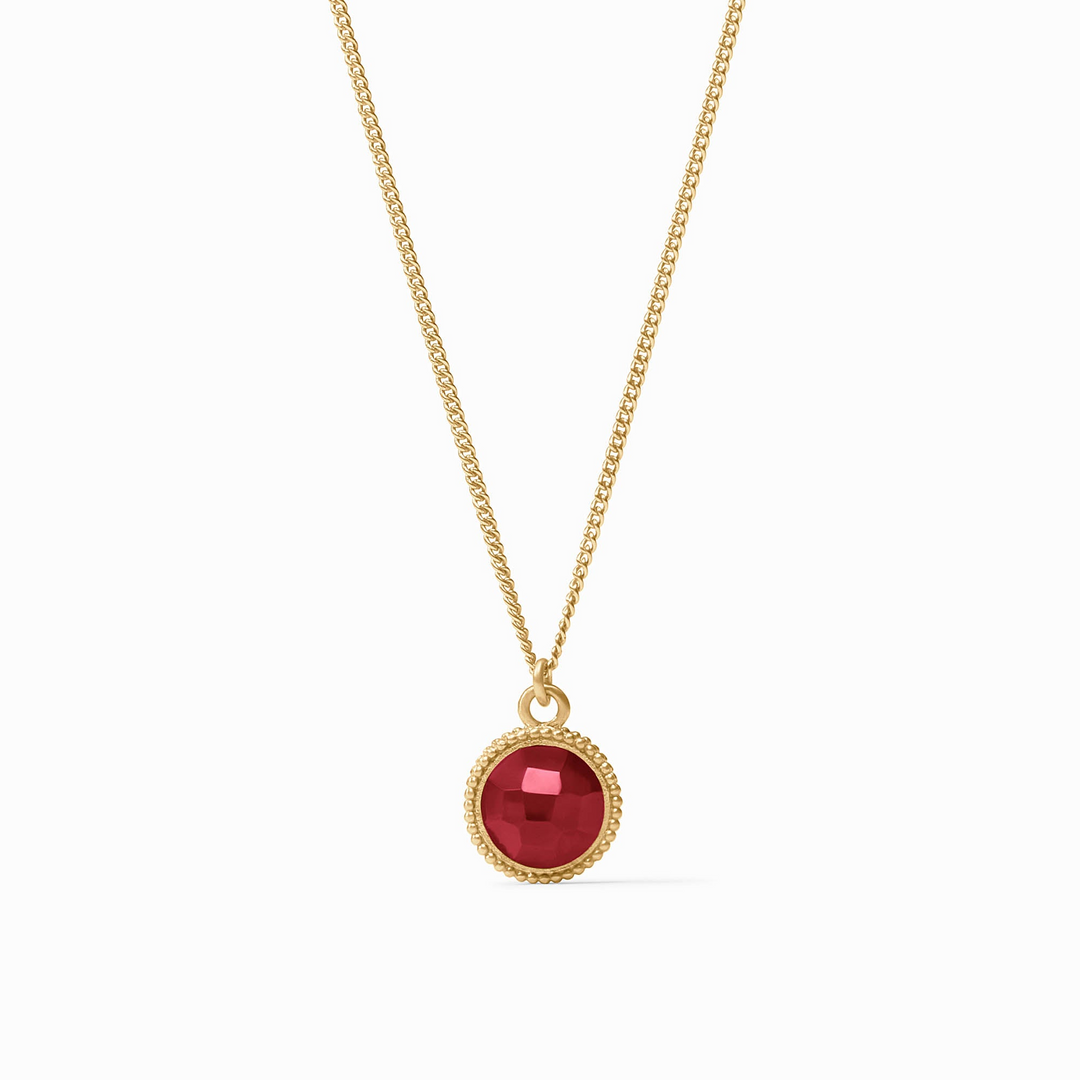 Fleur-De-Lis Solitaire Necklace in 24K gold plate with a round red faceted glass pendant.