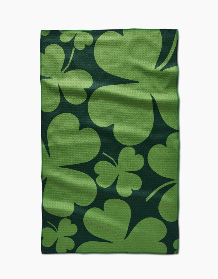 Everyday Tea Towel with a green waffle weave fabric featuring a large clover pattern.