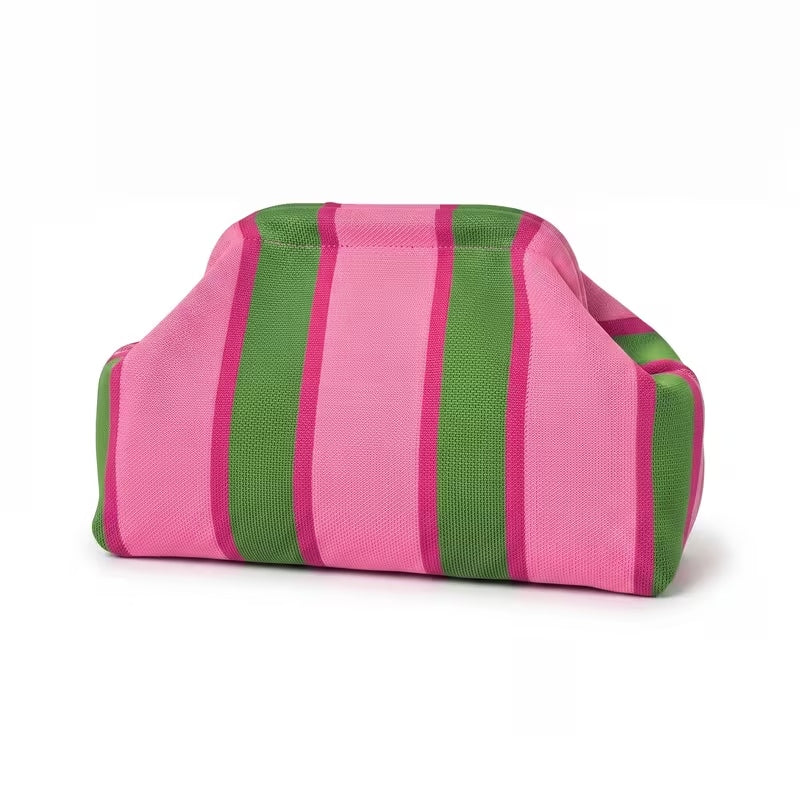 Pink and green striped knit clutch bag with a magnetic frame closure.