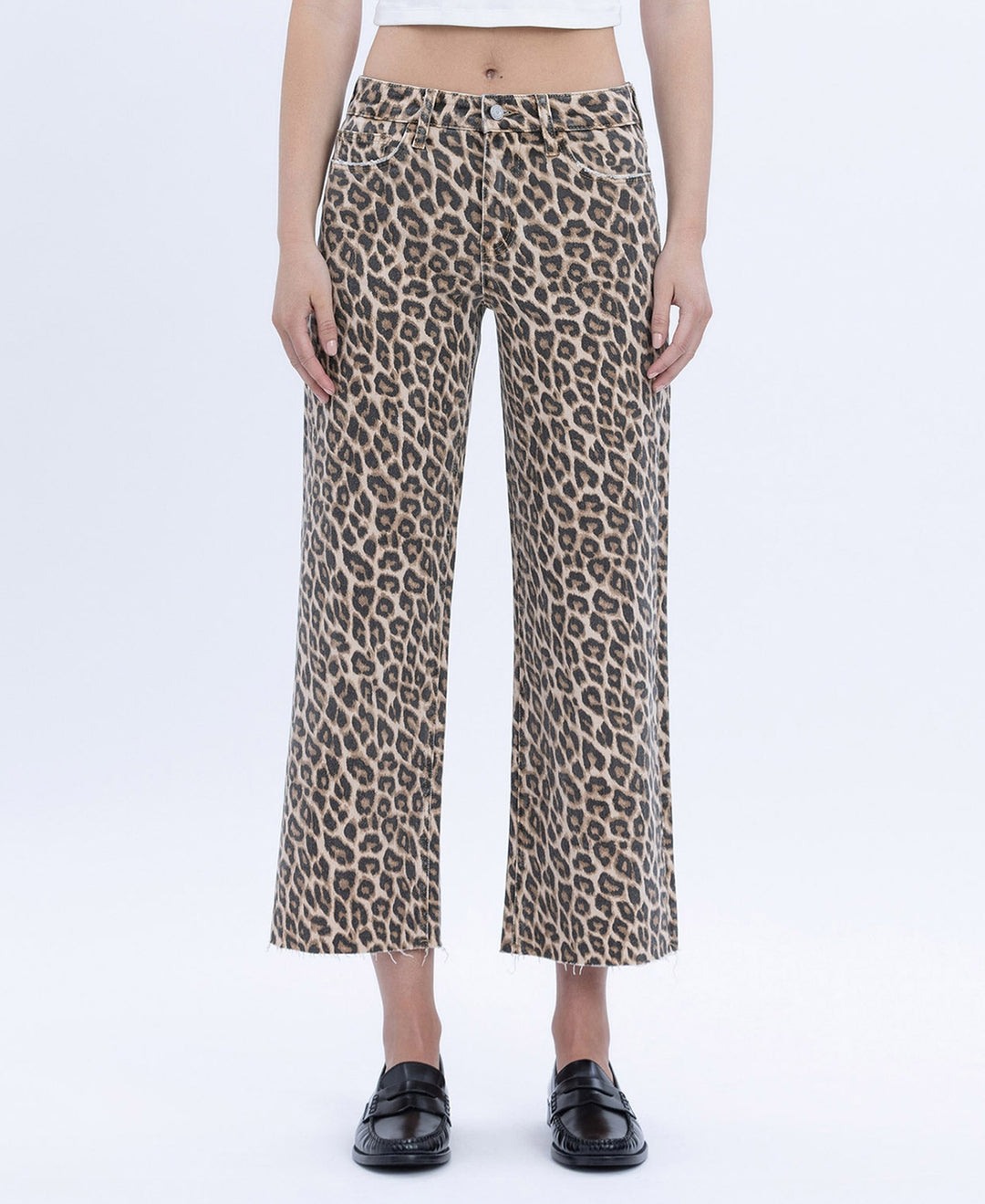 Women's high-rise animal print wide-leg crop jeans in stretch denim with raw hem.