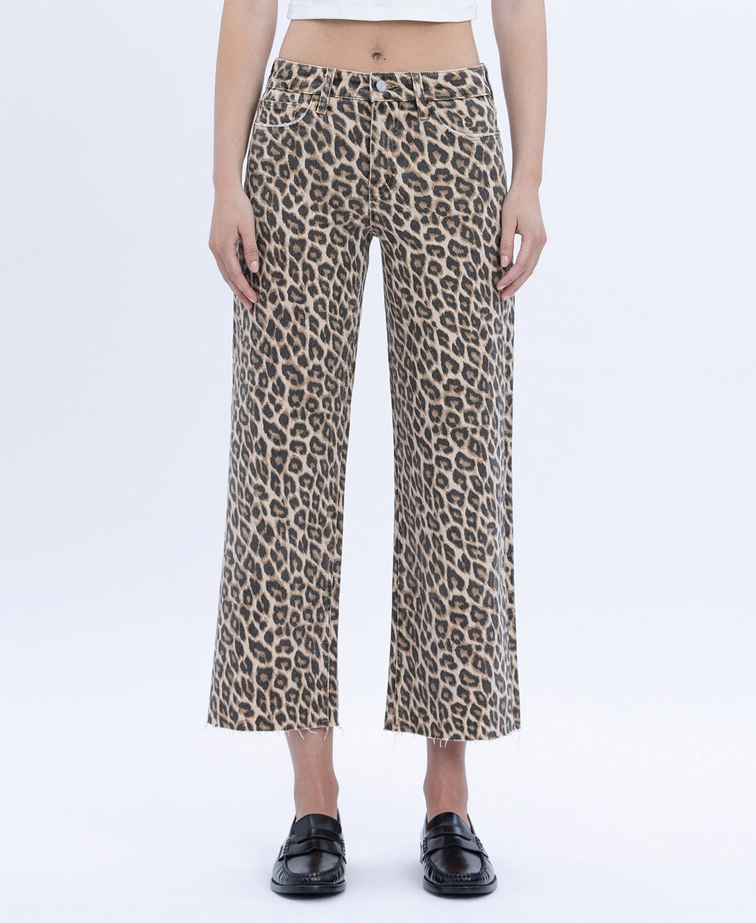 Women's high-rise animal print wide-leg crop jeans in stretch denim with raw hem.