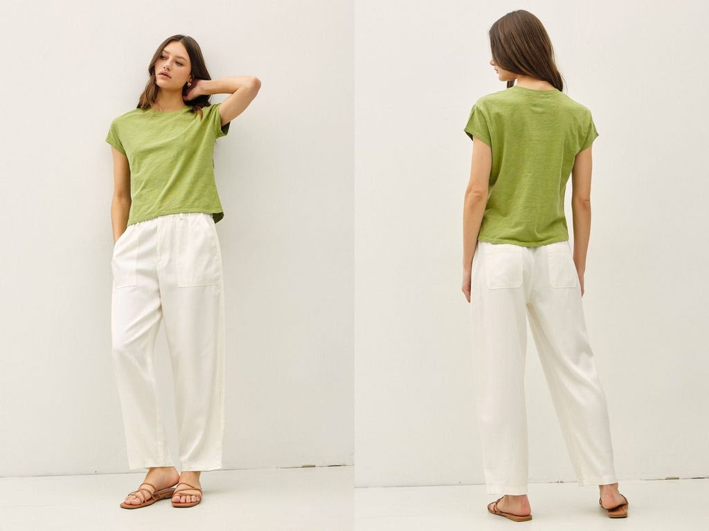 Natalie tapered pants in a neutral tone made from Tencel cotton linen blend with a relaxed silhouette.