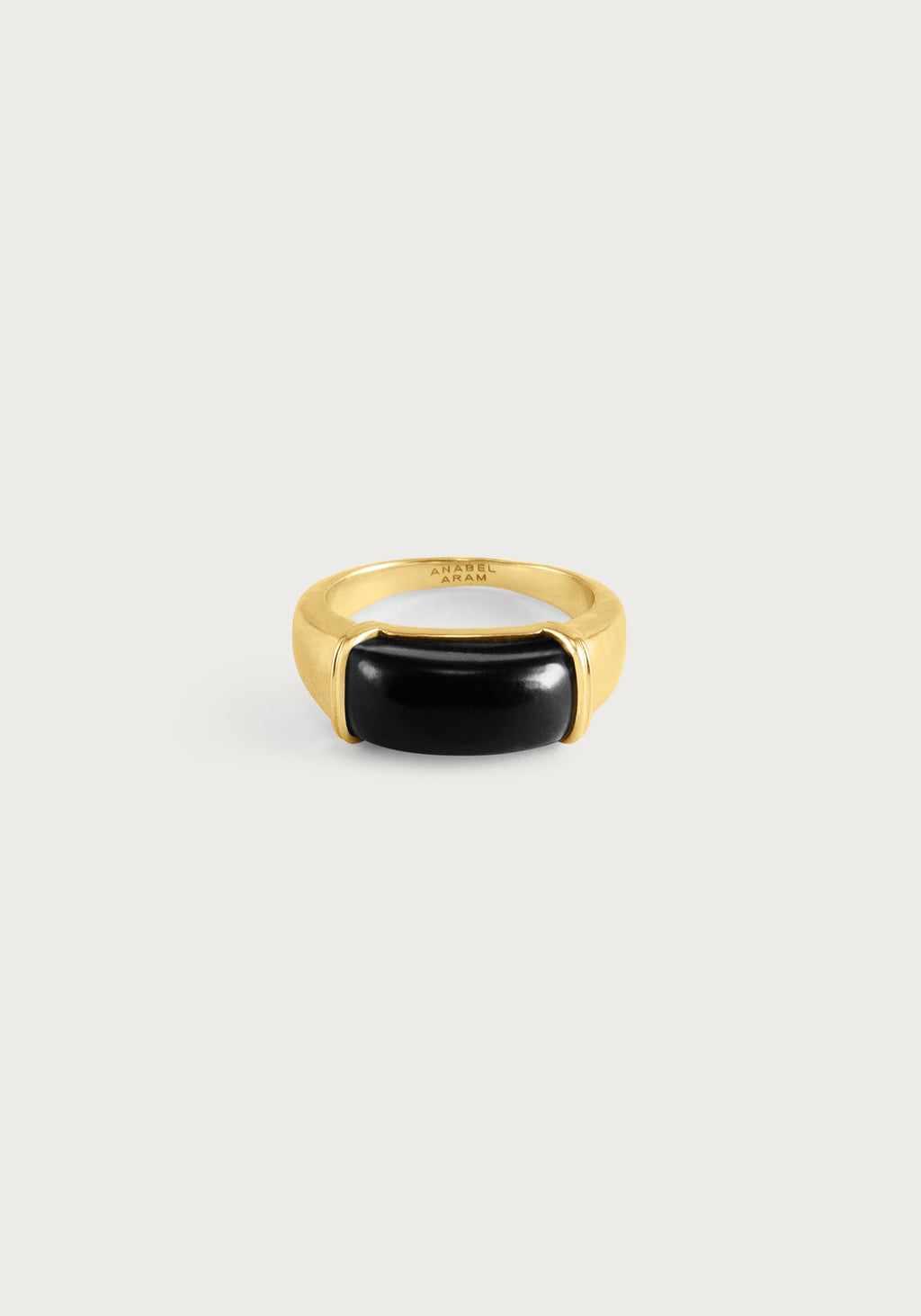 Forza Ring in 18K gold plated brass featuring a polished black onyx stone inlay.