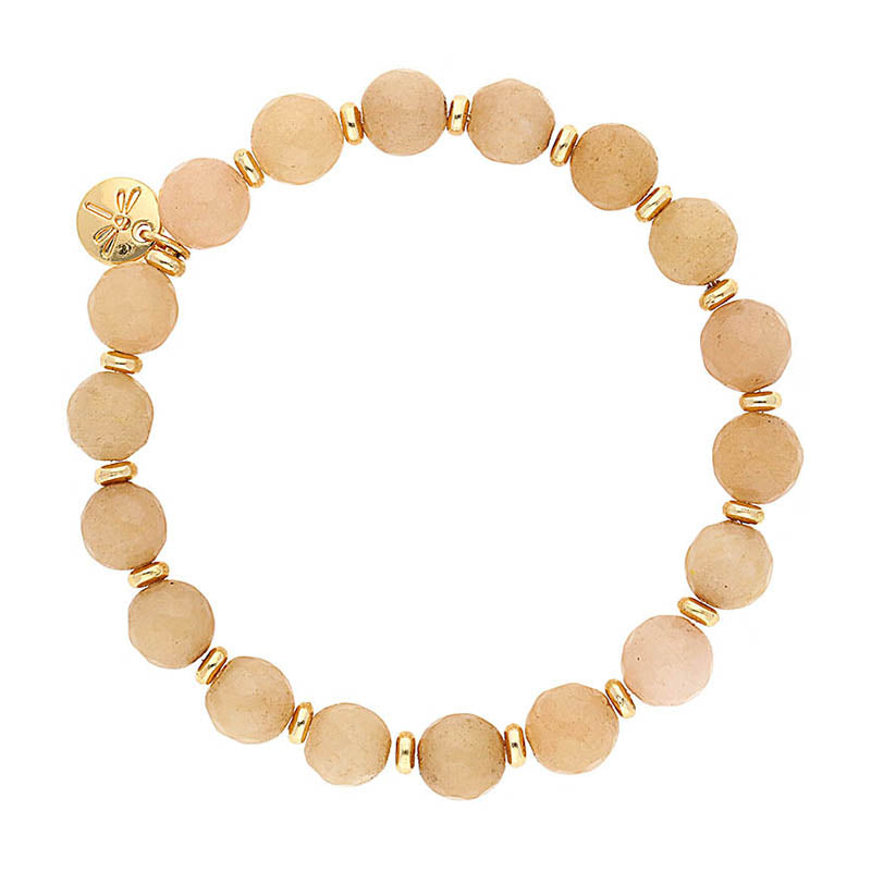 Lizas Beaumont Natural Bracelet featuring beige stone beads and gold-toned spacers and charm.
