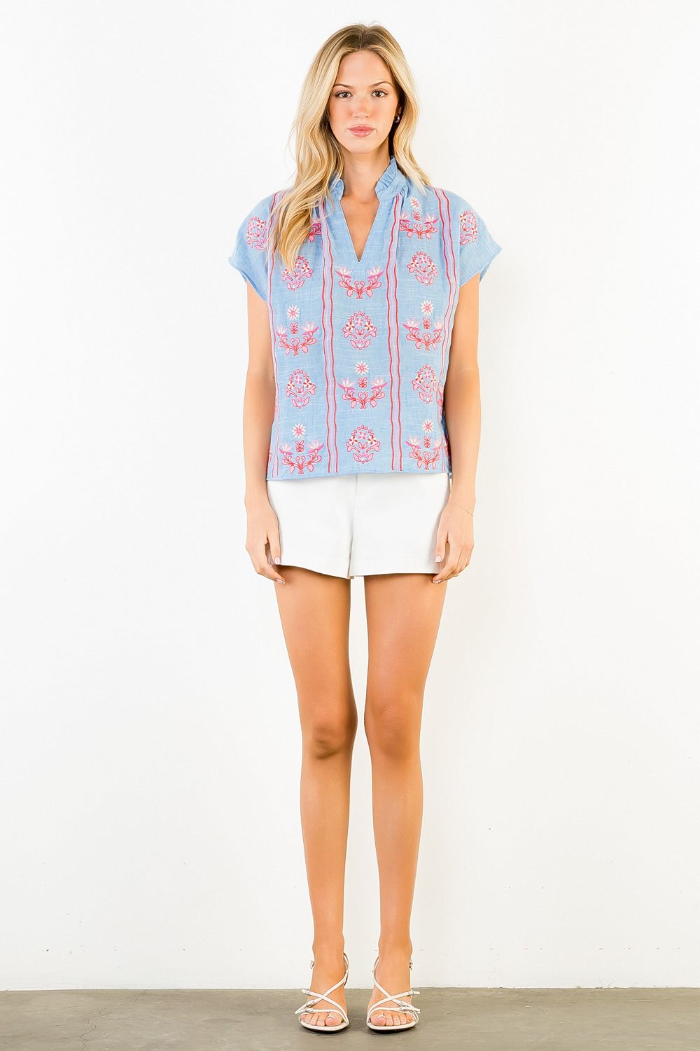 Ruby textured top with floral embroidery featuring a relaxed fit.