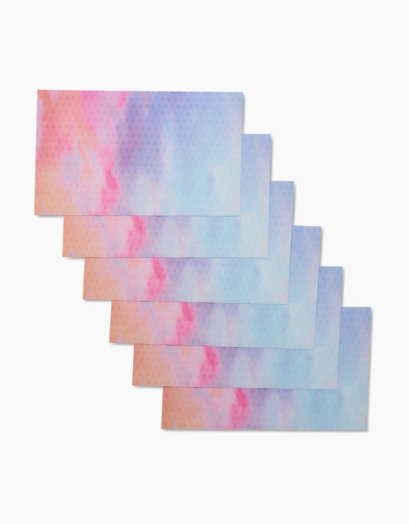 Set of reusable kitchen cloths made from post-consumer recycled materials in a neutral tone.
