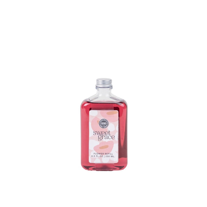 Sweet Grace fragrance refill oil bottle with flower diffuser stem