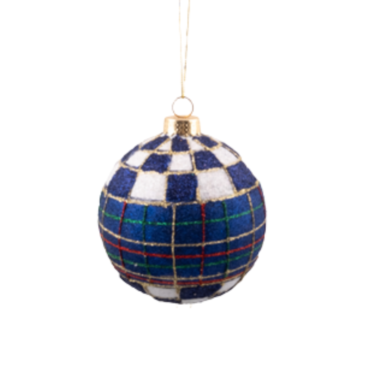 Navy tartan glass ball ornament with blue and white checkered patterns and gold glitter accents.
