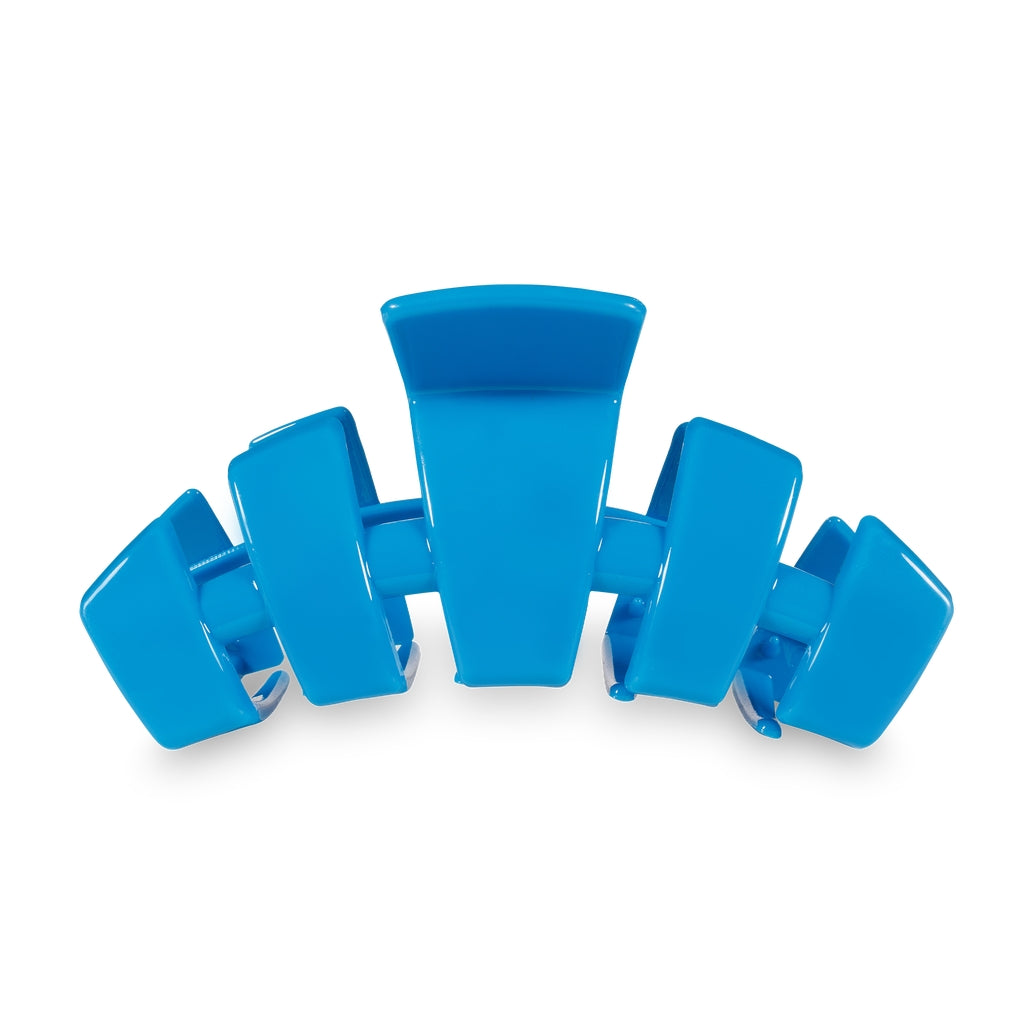 Large classic hair clip with bendable teeth in a neutral tone.