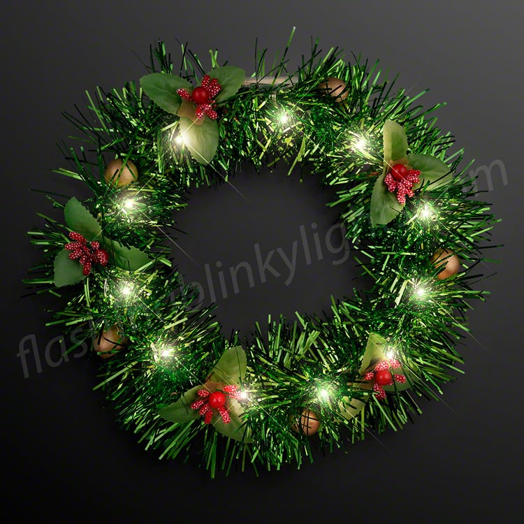 Christmas Crown LED Tinsel Wreath Headband with warm white lights, green tinsel, and holly berries.