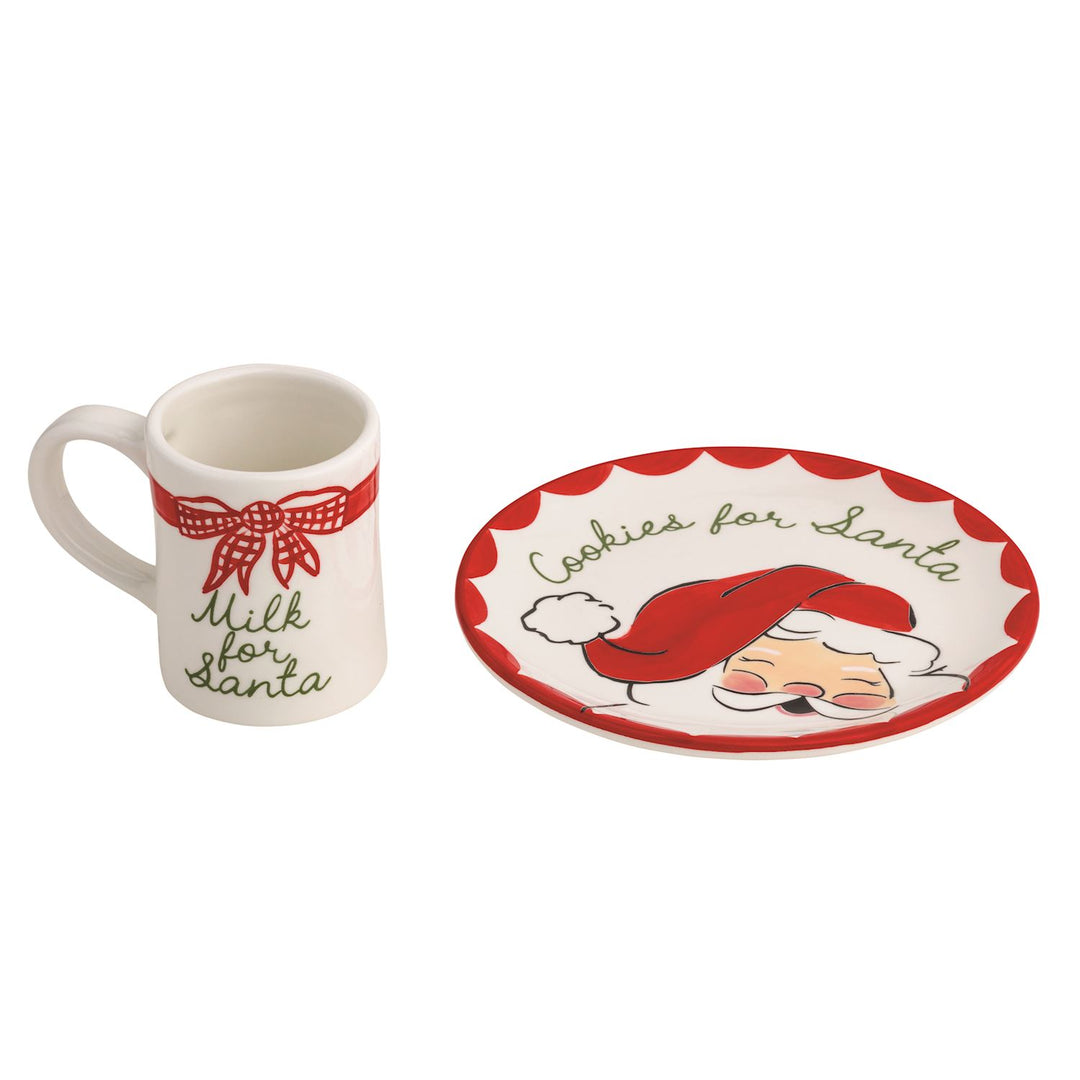 Ceramic Milk & Cookies For Santa Set featuring a white mug and a plate with Santa Claus illustrations.