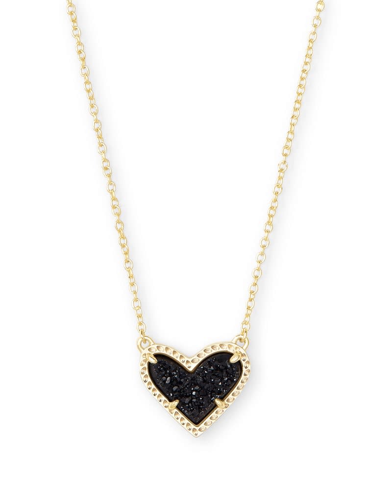 Silver-tone Ari Heart short pendant necklace with asymmetrical heart shape on a chain.