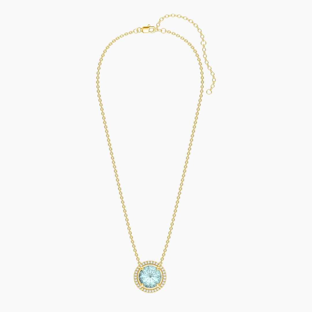 Gold-plated birthstone pendant necklace with a round light blue stone and diamond halo.